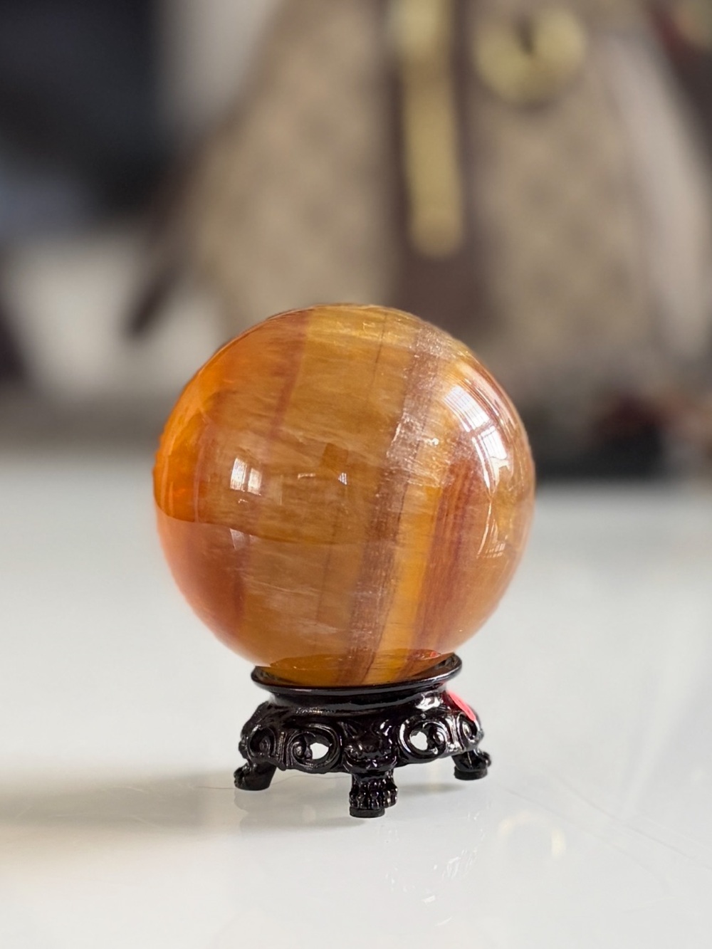 Polished Yellow Fluorite Crystal Sphere on Decorative Stand